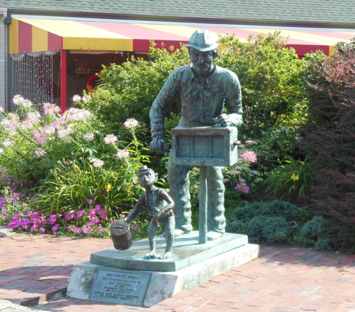 organ grinder statue